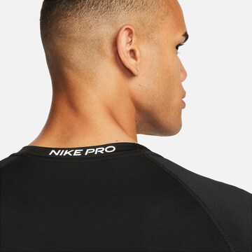 NIKE Funktionsskjorte 'Pro' i sort