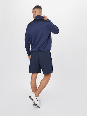 NIKE Regular Sportbroek 'FLEX' in Blauw