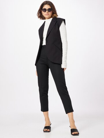 Coupe slim Pantalon à plis Sisley en noir