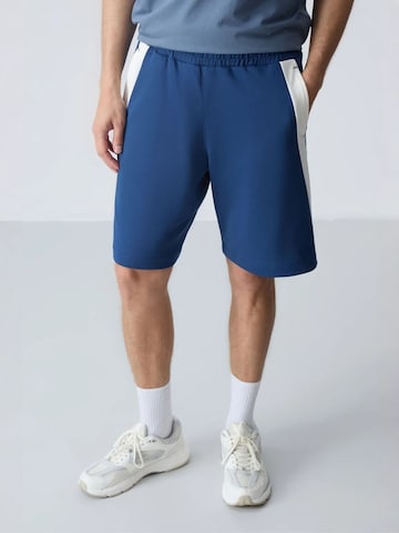 Pantalon Tommy Life en bleu : devant