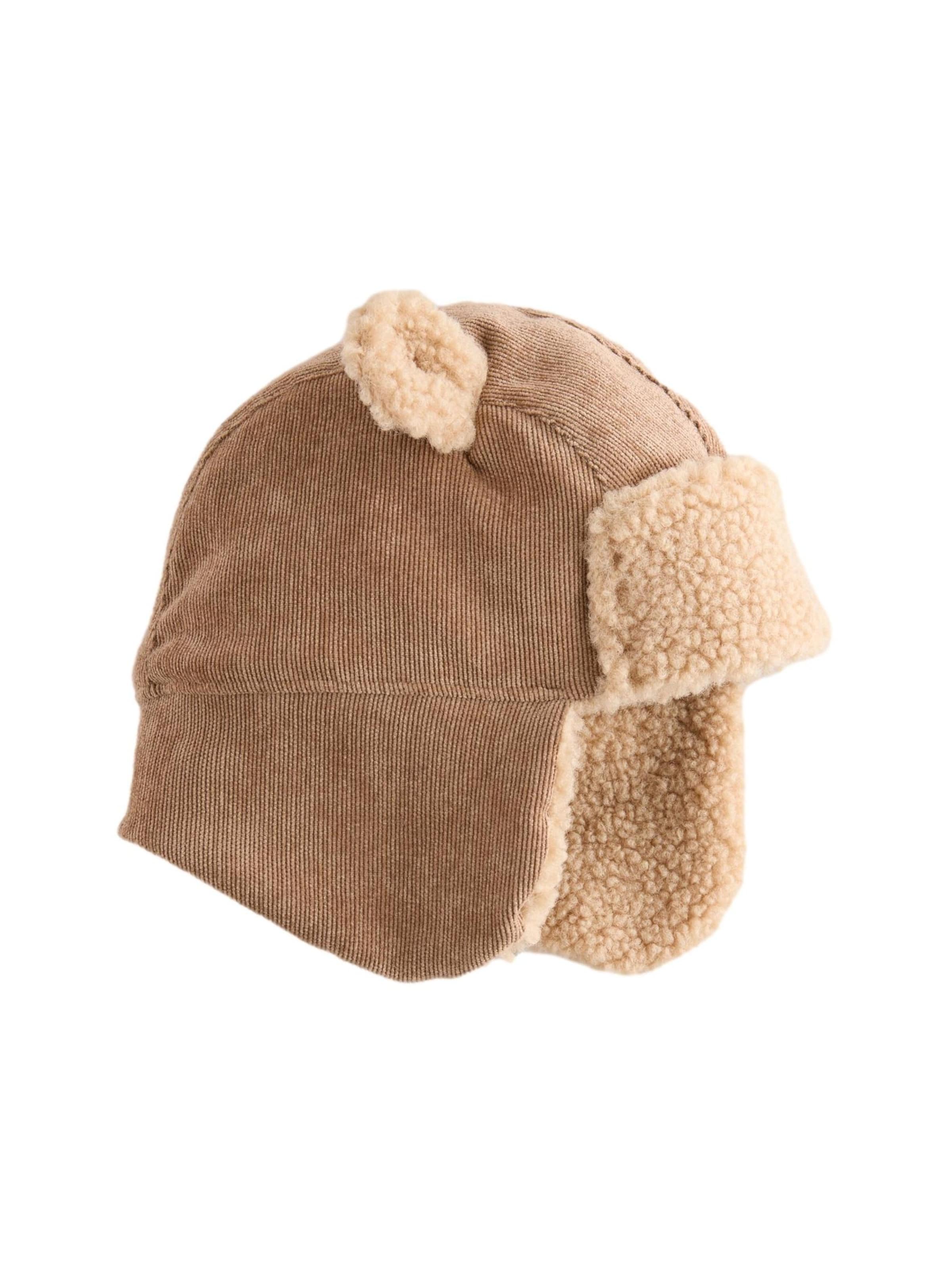 Next Hue i brun: forside