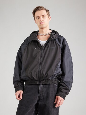 Han Kjøbenhavn Between-season jacket in Black: front