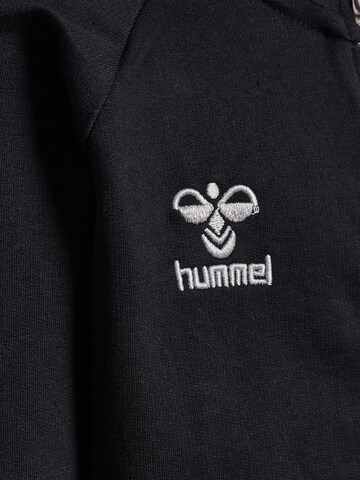 Veste de survêtement 'Move' Hummel en noir