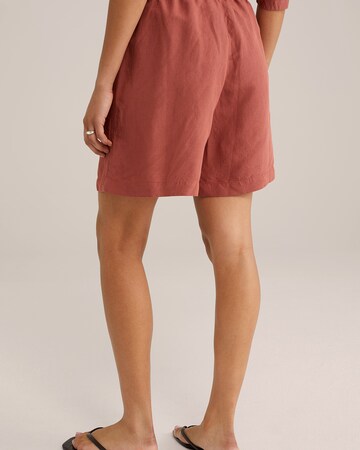 WE Fashion Loose fit Trousers in Brown