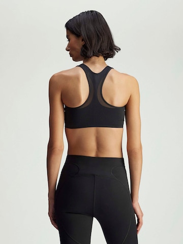 ADIDAS BY STELLA MCCARTNEY - Soutien Bustier Soutien de desporto 'Power Impact' em preto