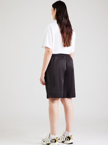 Loosefit Pantaloni con pieghe 'CARMANITA' di ONLY Carmakoma in nero