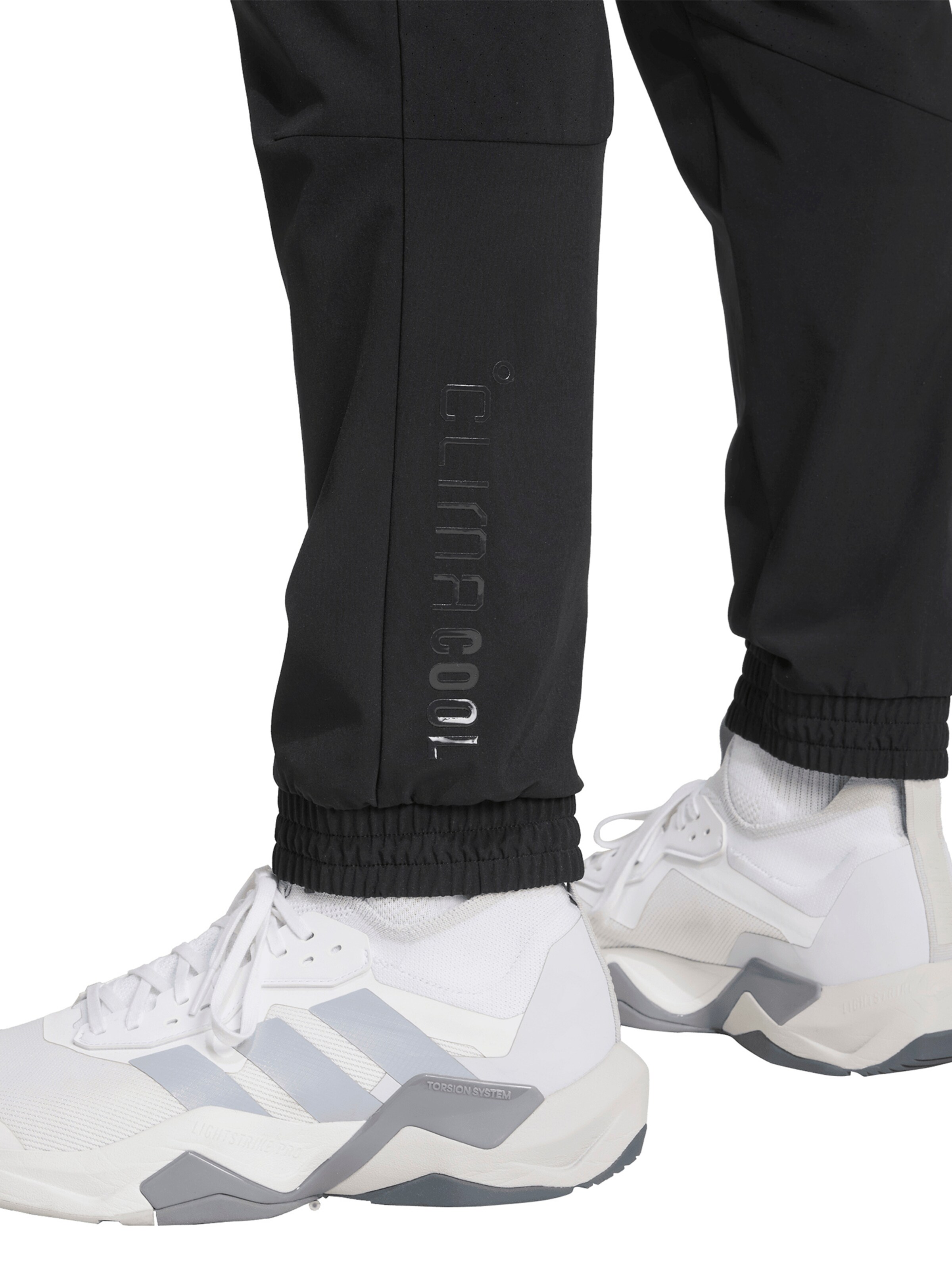 Tapered Pantaloni sportivi 'Tech Apparel' di ADIDAS PERFORMANCE in nero