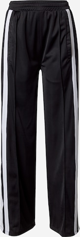 Karo Kauer Regular Trousers with creases in Black: front