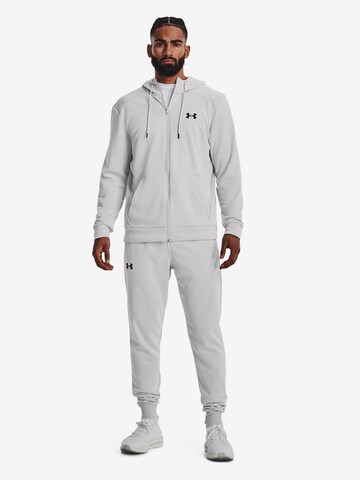 UNDER ARMOUR Tapered Sportbroek in Grijs: voorkant