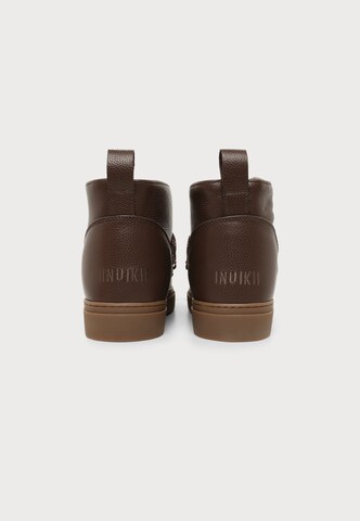 INUIKII Boots in Brown