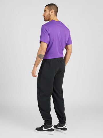 Nike Sportswear Tapered Sports trousers 'Club Polar' in Black