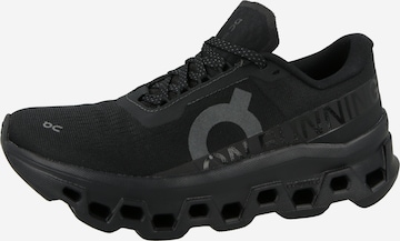 On Juoksukengät 'Cloudmonster 1' värissä musta: etupuoli