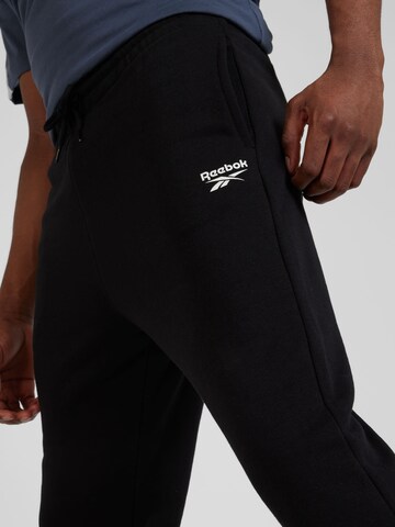 Tapered Pantaloni sportivi di Reebok in nero