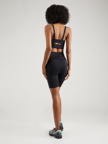 UNDER ARMOUR Skinny Spodnie sportowe w kolorze czarny