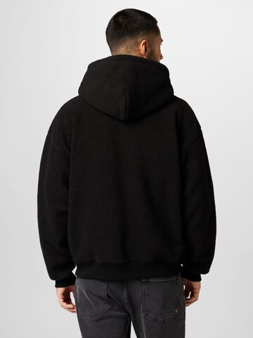 LEVI'S ® Fleece Jacket 'Sherpa Full Zip Hoodie' in Black