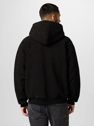 LEVI'S ® Fleece jacket 'Sherpa Full Zip Hoodie' in Black