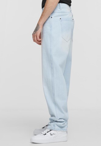 Karl Kani Tapered Jeans in Blau