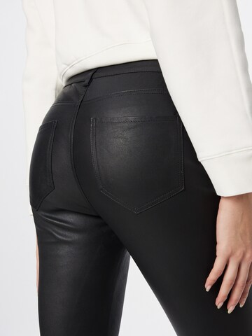 AllSaints Skinny Kalhoty 'INA' – černá