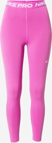 NIKE Skinny Workout Pants in Pink: front