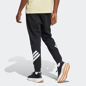 ADIDAS SPORTSWEAR Tapered Παντελόνι φόρμας 'Future Icons' σε μαύρο