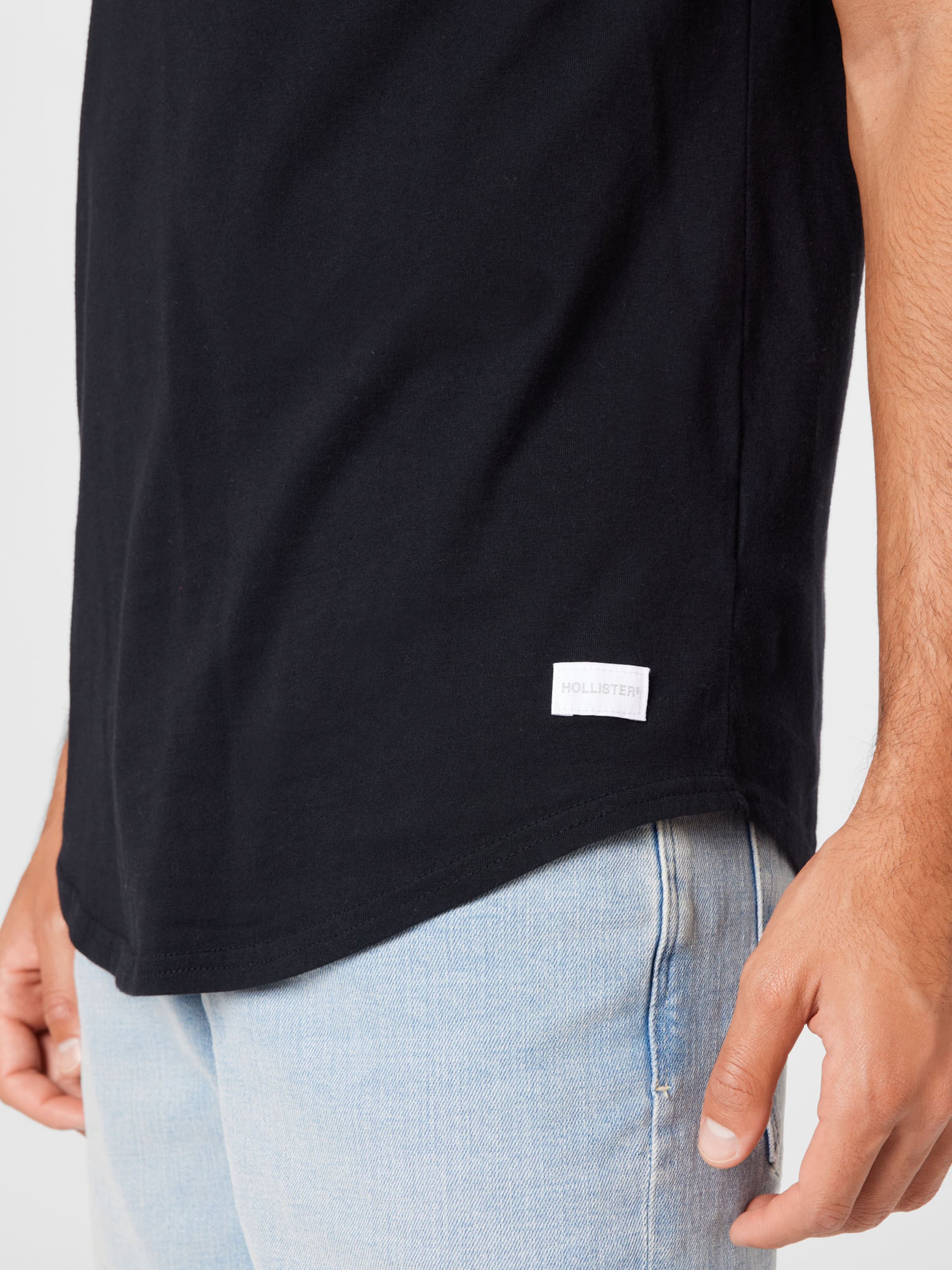 Männer Shirts HOLLISTER T-Shirt in Schwarz - HI36882
