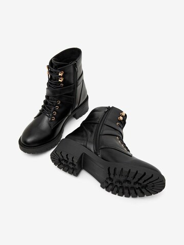 Bottines à lacets 'Adelyn' Bianco en noir