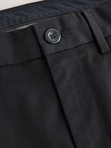 NextSlimfit Chino hlače 'Motionflex' - crna boja