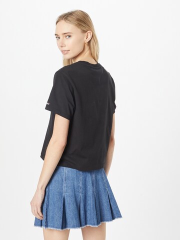 T-shirt 'Serif Linear' Tommy Jeans en noir