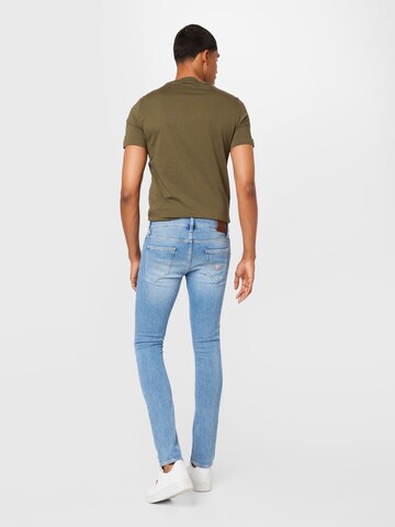 Skinny Jeans 'Miami' di GUESS in blu