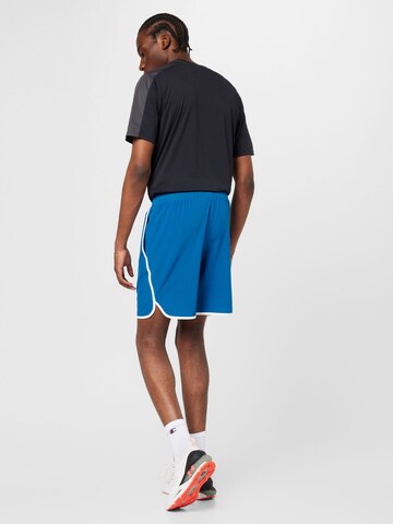 UNDER ARMOUR Regularen Športne hlače 'HIIT' | modra barva