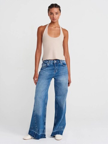 Top di Dilvin in beige