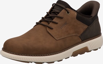 Chaussure de sport à lacets Rieker en marron : devant
