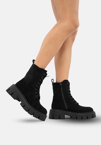 Salinyang Lace-up bootie in Black