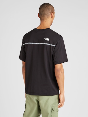 Tricou 'ZUMU' de la THE NORTH FACE pe negru: față