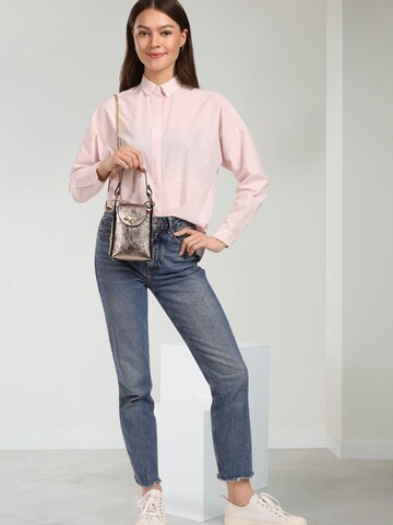 Florence Schoudertas in Bruin