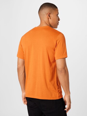 NIKERegular Fit Tehnička sportska majica 'Athlete' - narančasta boja