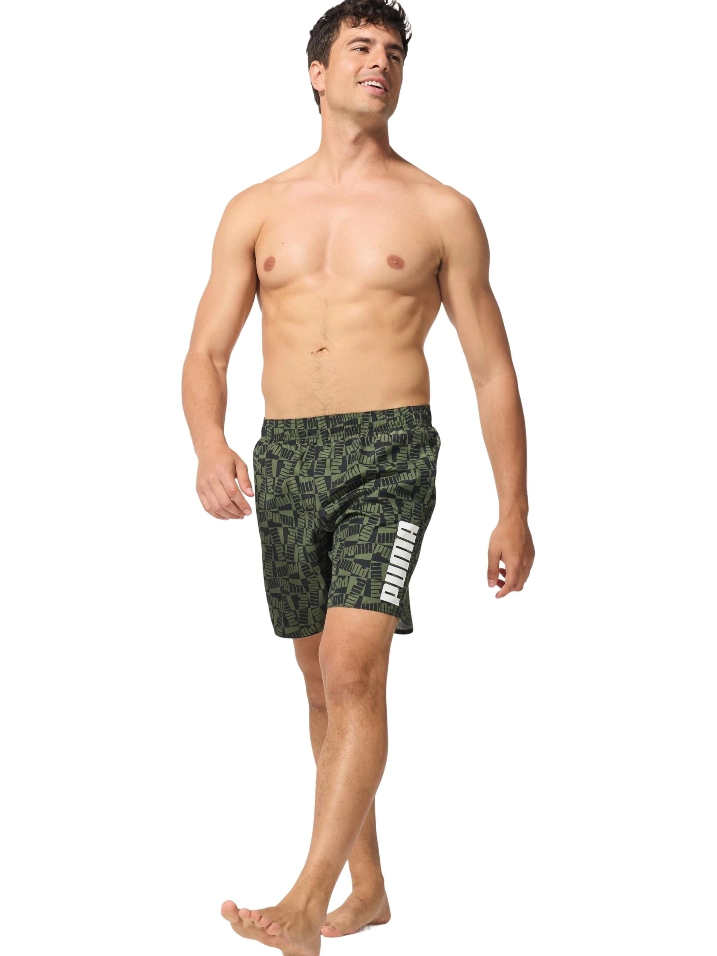 PUMA - Bermudas en verde