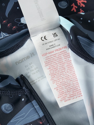 NAME IT - Protección UV 'NMMZIPPO' en azul