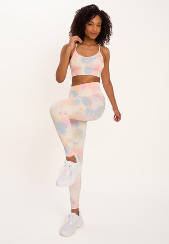 Skinny Pantalon de sport 'Maya' OCEANSAPART en jaune