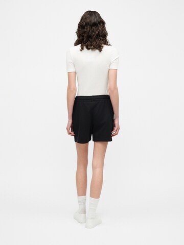 regular Pantaloni di Calvin Klein Jeans in nero