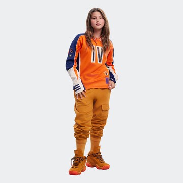 ADIDAS ORIGINALS Tapered Pants 'Ivy Park' in Orange