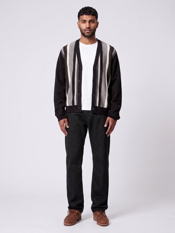 Carhartt WIP Baggy Jeans 'KLONDIKE' in Black: front