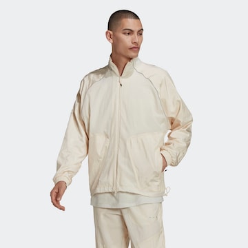 ADIDAS ORIGINALS Övergångsjacka 'Reveal Material Mix' i beige: framsida