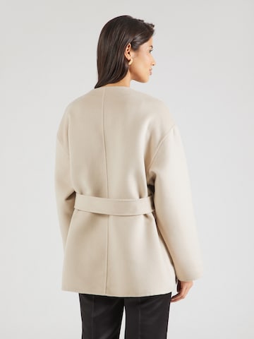 millane Tussenjas in Beige