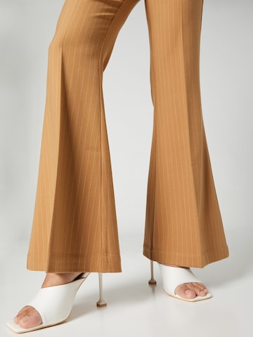 Bella x ABOUT YOU Regular Pants 'Lola' in Brown