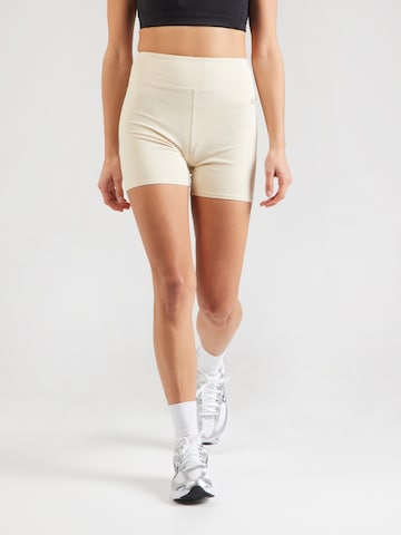 Skinny Pantalon de sport EA7 Emporio Armani en gris : devant