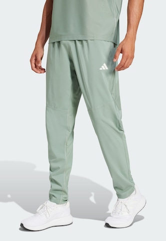 ADIDAS PERFORMANCE Tapered Sports trousers 'Own The Run' in Green: front