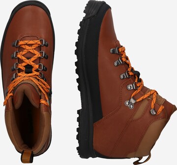 TIMBERLAND Fűzős csizma 'World Hiker' - barna