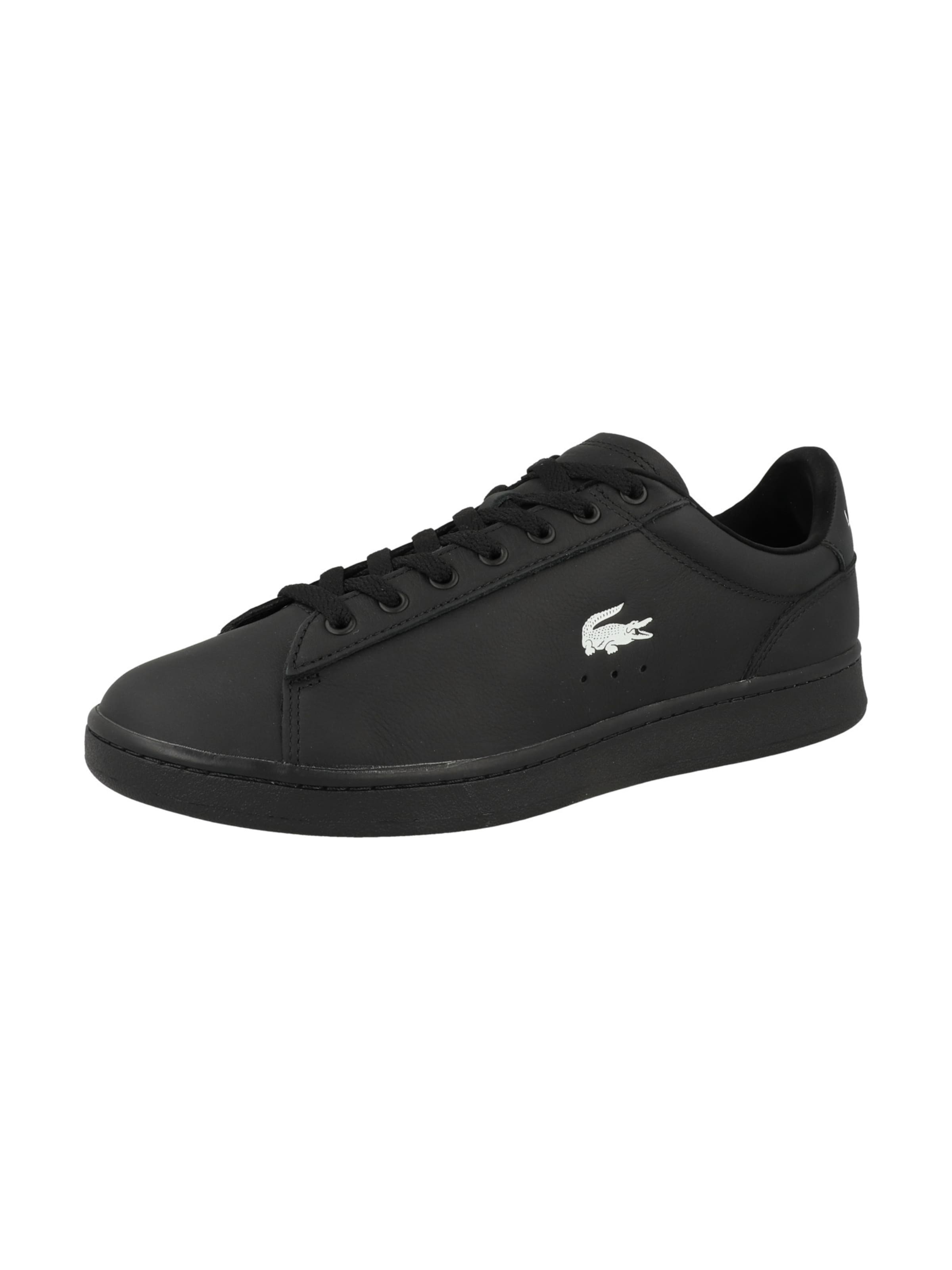 Baskets basses LACOSTE en noir : devant