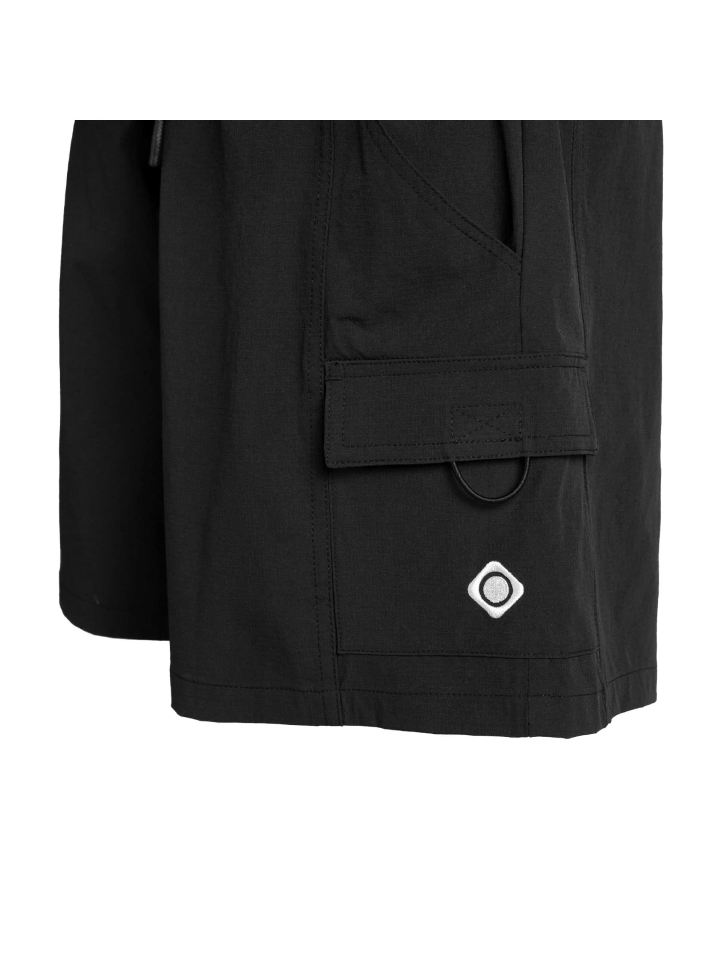 regular Pantaloni sportivi di Izas in nero